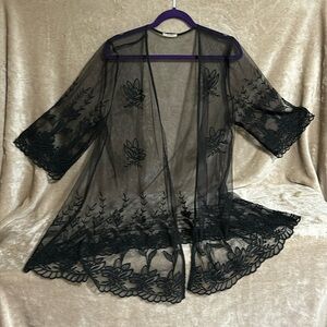 Jacket sheer black. Sz L. Maurice’s. 3/4 sleeves. Emb detail.